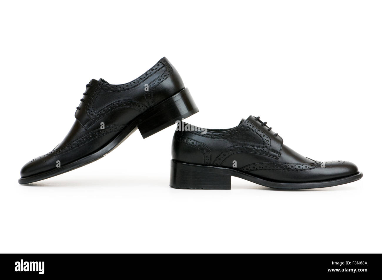Black shoes isolated on the white background Stock Photo - Alamy