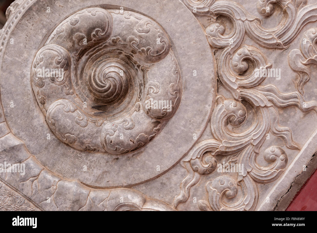 Asian stone artwork in a shape of a flower Stock Photo Alamy