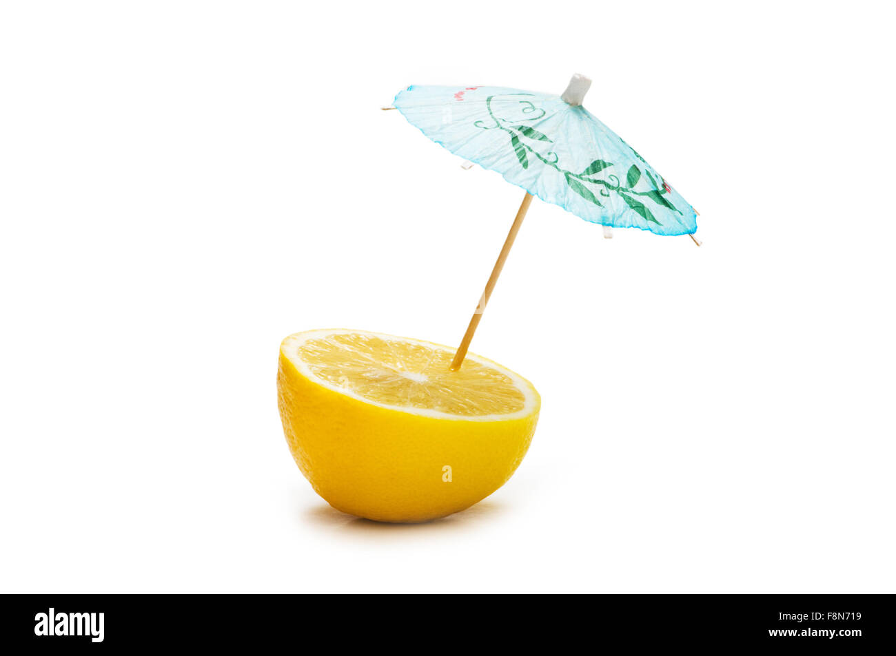 Lemon and umbrella isolated on the white Stock Photo Alamy