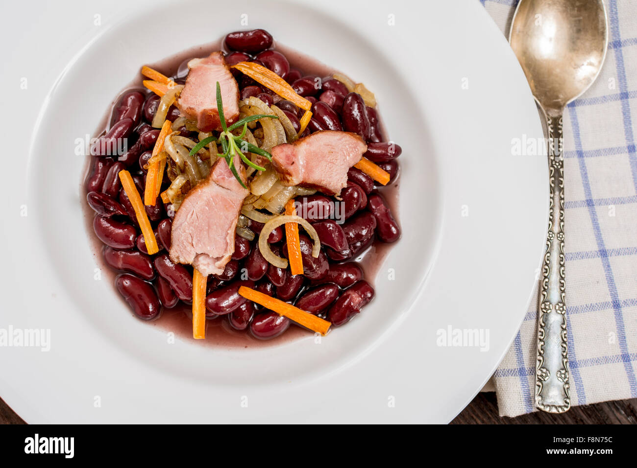 Traditional red beans with meat and vegetables Stock Photo