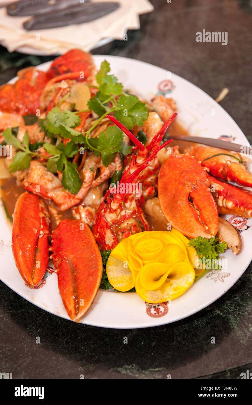 Asian styled lobster dish on table in restaurant Stock Photo Alamy