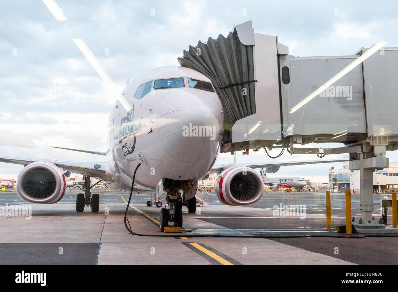 Airplane on the tarmac at Cairns Airport, Australia. Stock Photo