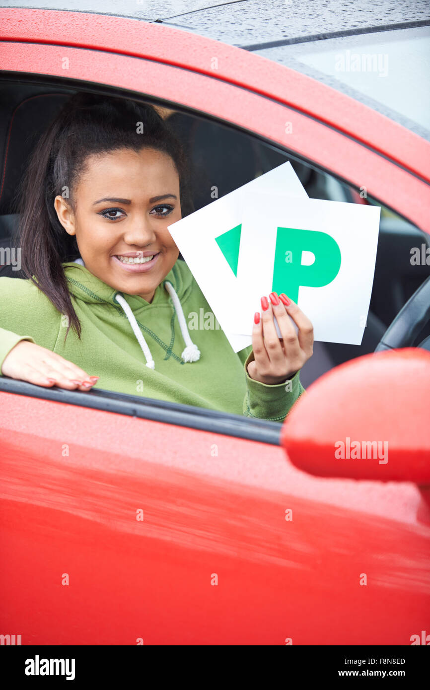 Teenage Girl Recently Passed Driving Test Holding P Plates Stock Photo