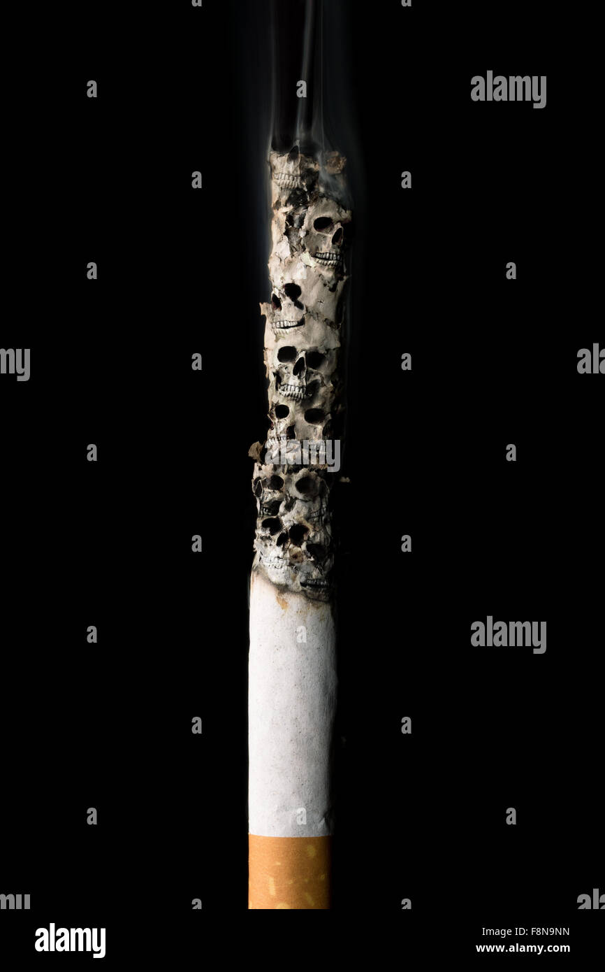 burning cigarette with ash and skulls Stock Photo Alamy