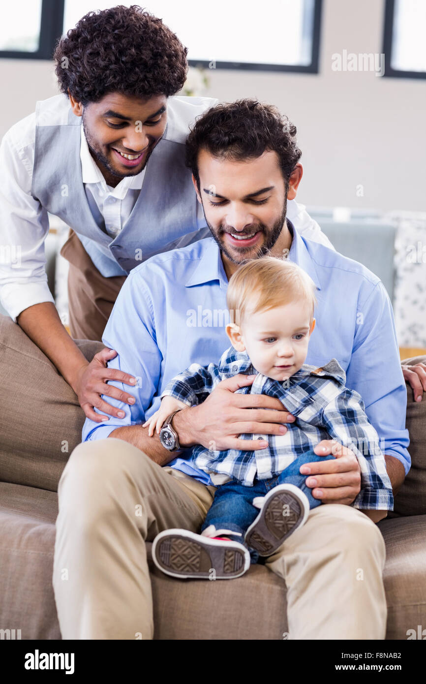 Happy gay couple with child Stock Photo