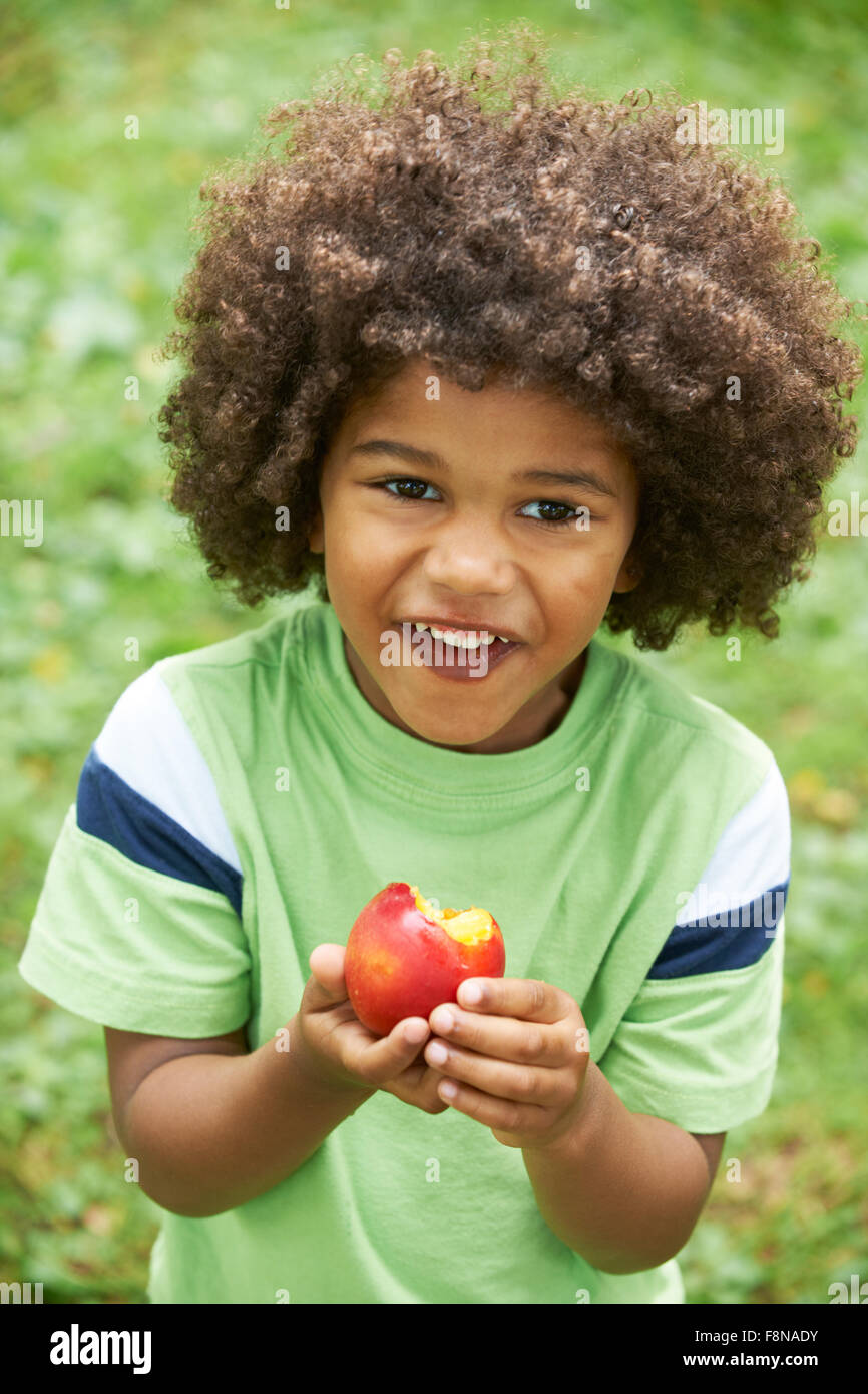 Little Boy Eating Nectarine Outdoors Stock Photo Alamy