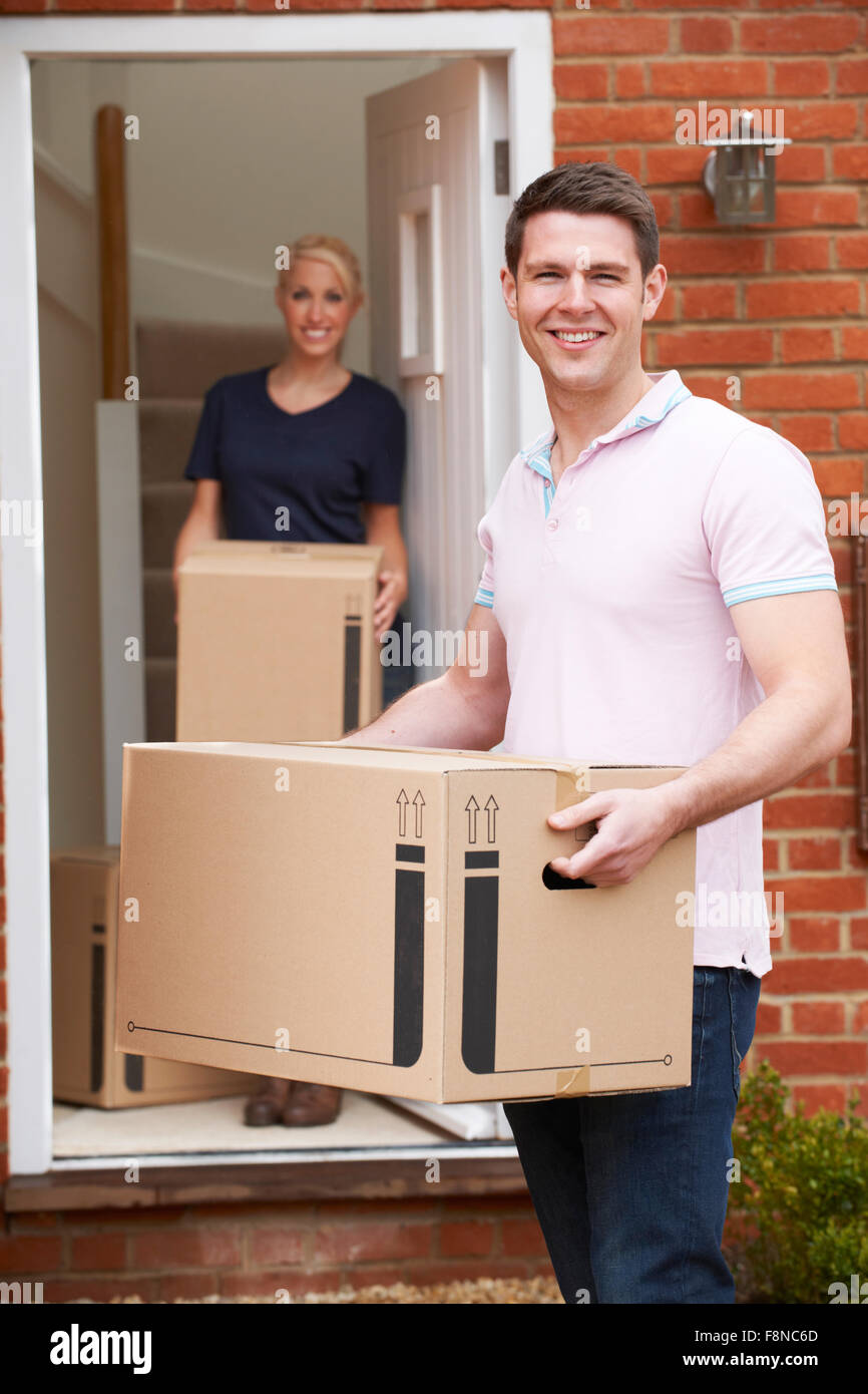 Young Couple Moving Into New Home Together Stock Photo - Alamy