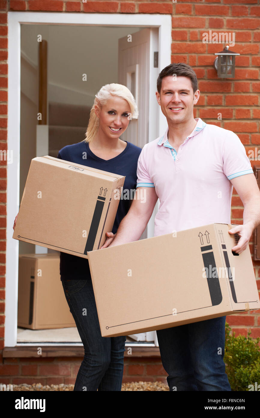 Young Couple Moving Into New Home Together Stock Photo - Alamy