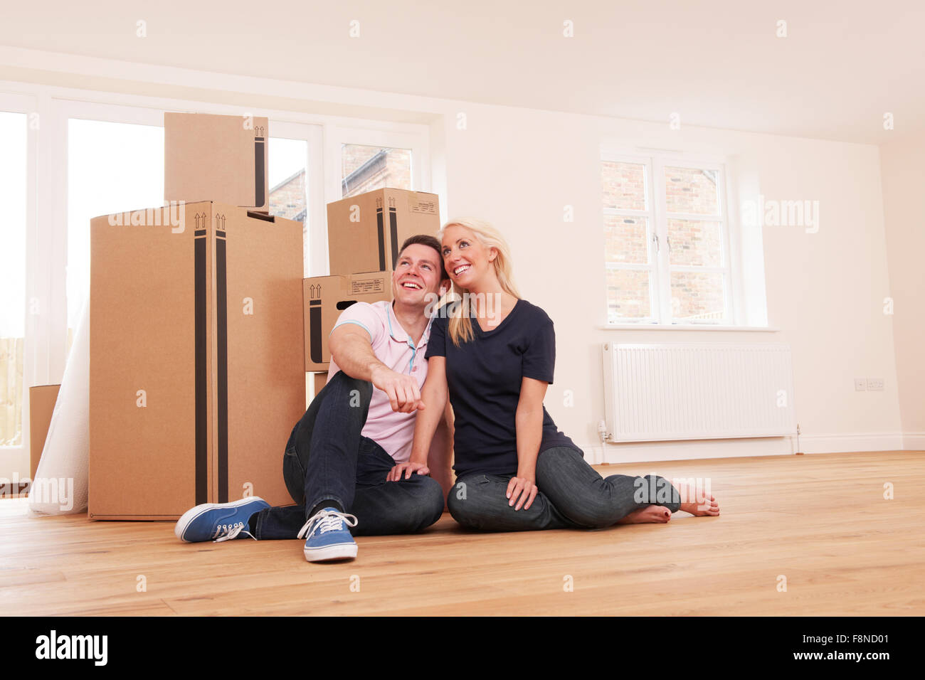Couple Moving Into New Home Together Stock Photo - Alamy