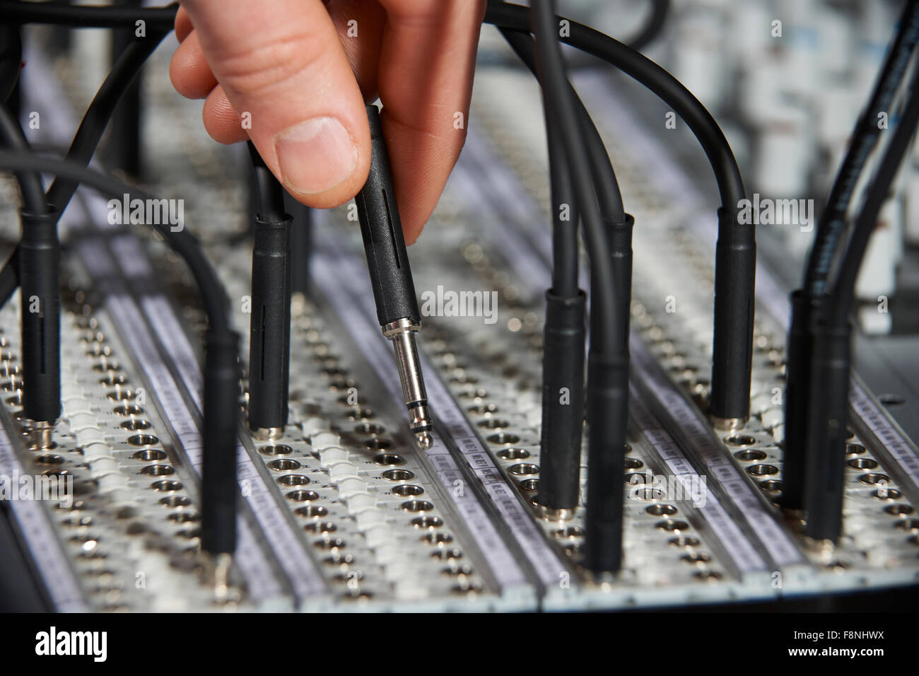 Hand Plugging Cable Into Recording Studio Patch Panel Stock Photo Alamy