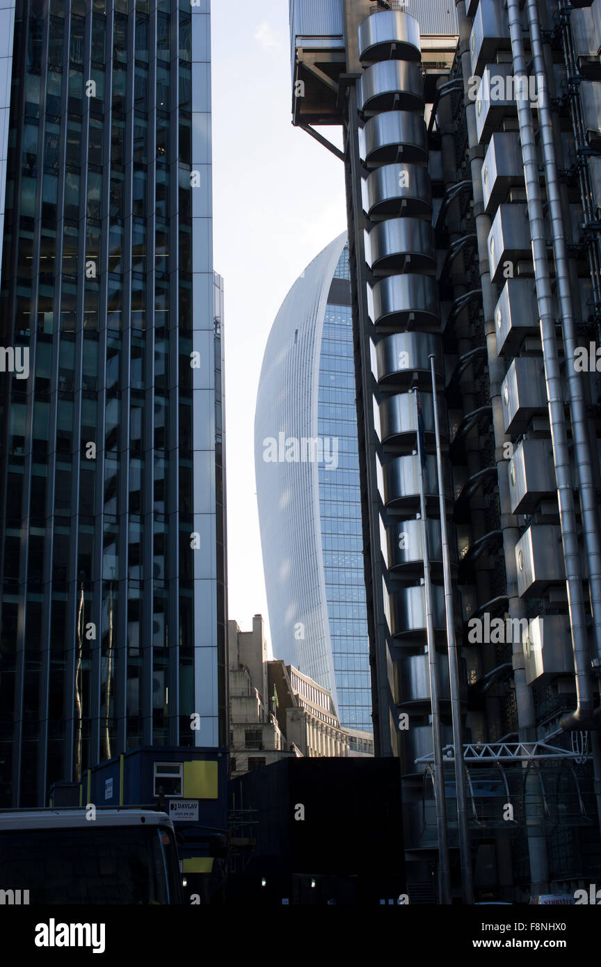 The walkie-talkie building in Central London at 20 Fenchurch Street with the Lloyds building aka Inside-Out building in the fore Stock Photo