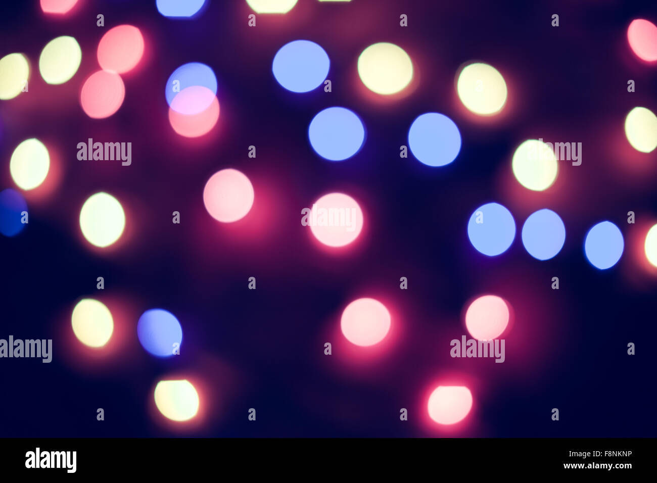 Defocused christmas lights. New Year bokeh. Abstract background for ...