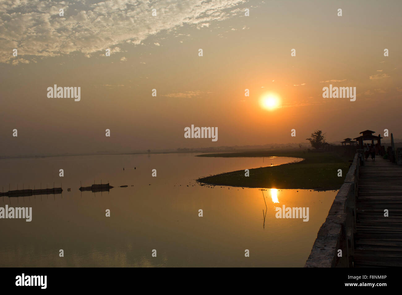 Sunset from the U-Bein bridge in Amarapura Stock Photo - Alamy