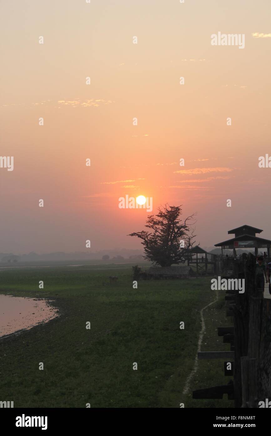 Sunset from the U-Bein bridge in Amarapura Stock Photo - Alamy