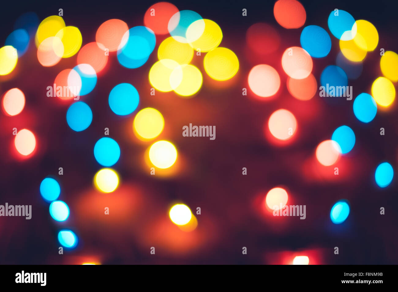 Defocused christmas lights. New Year bokeh. Abstract background for ...