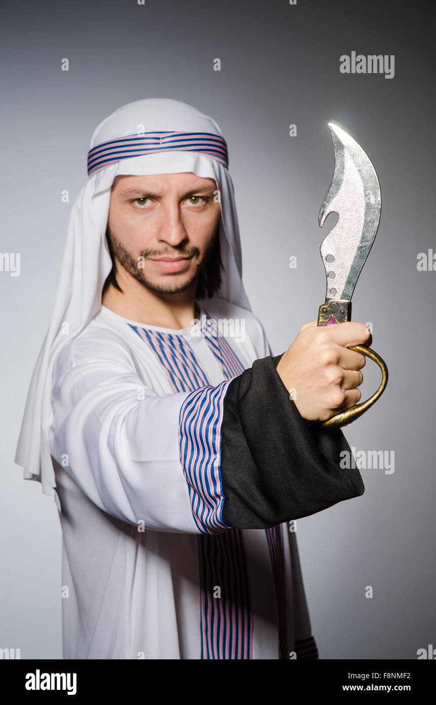 Arab man with sharp knife Stock Photo