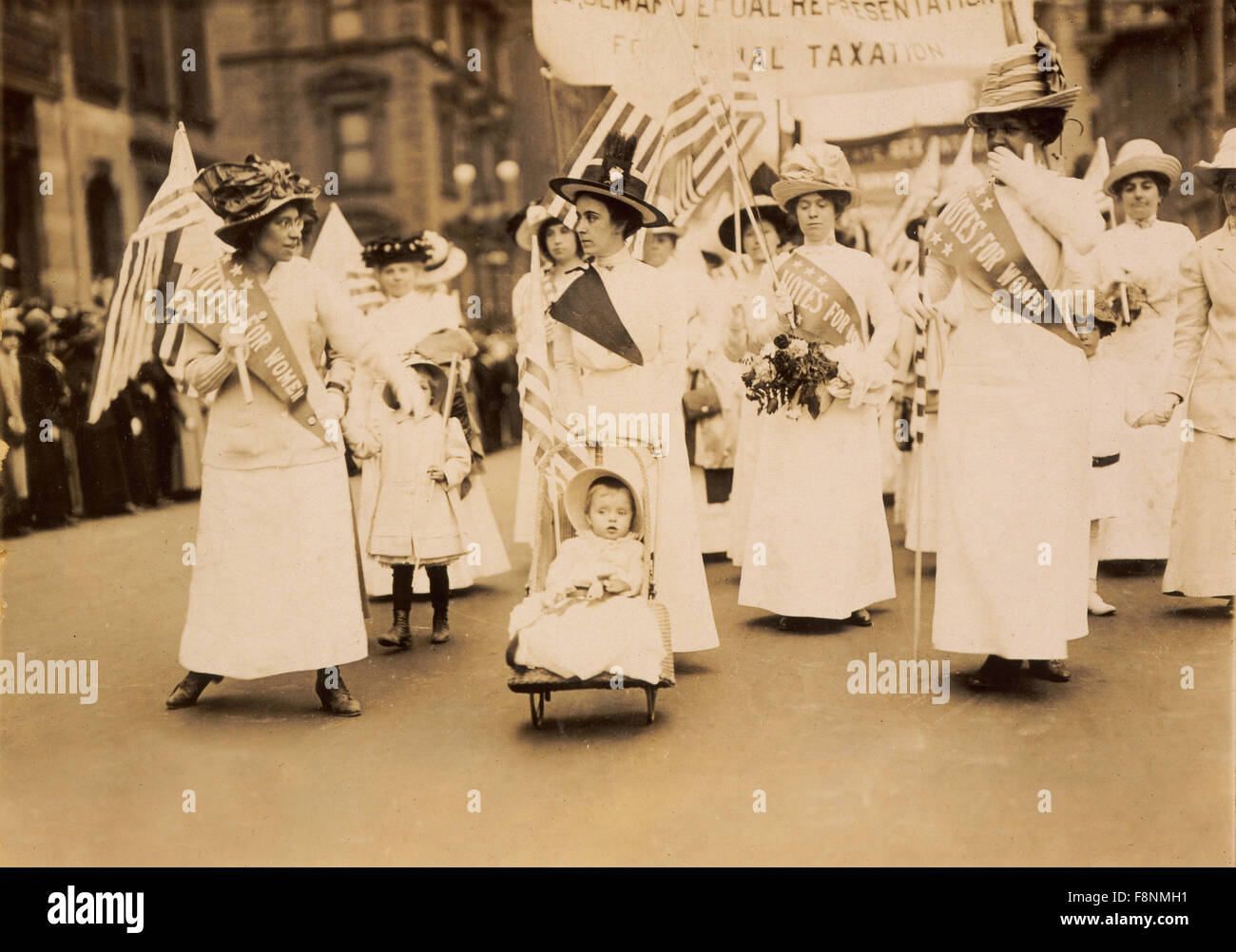 Group of Women and children Marching in Suffragist Parade, New York City, USA, circa 1912 Stock Photo