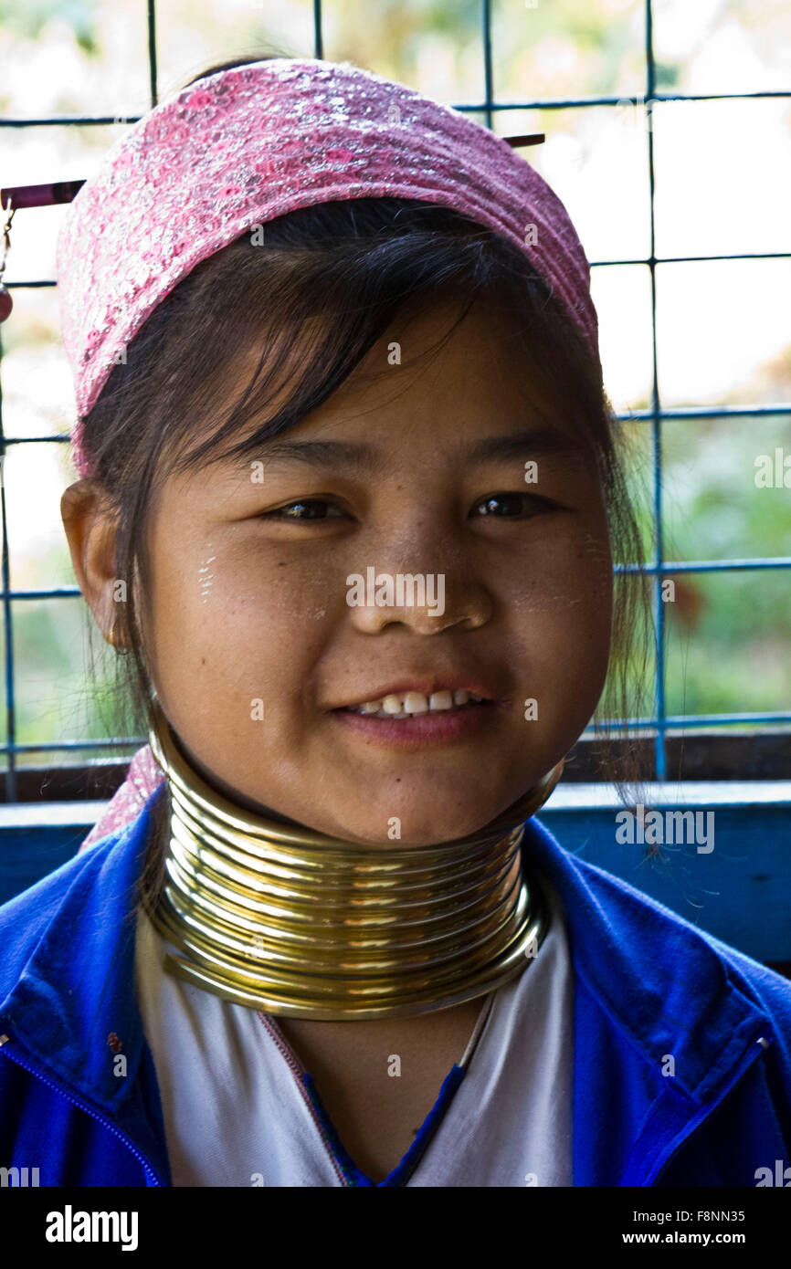 The Kayan women wear brass coils around their necks to give the