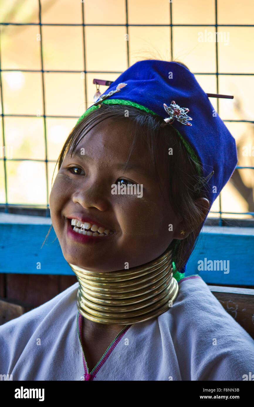 The Kayan women wear brass coils around their necks to give the