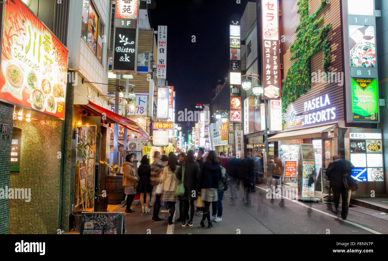 Tokyo commercial district at night Stock Photo