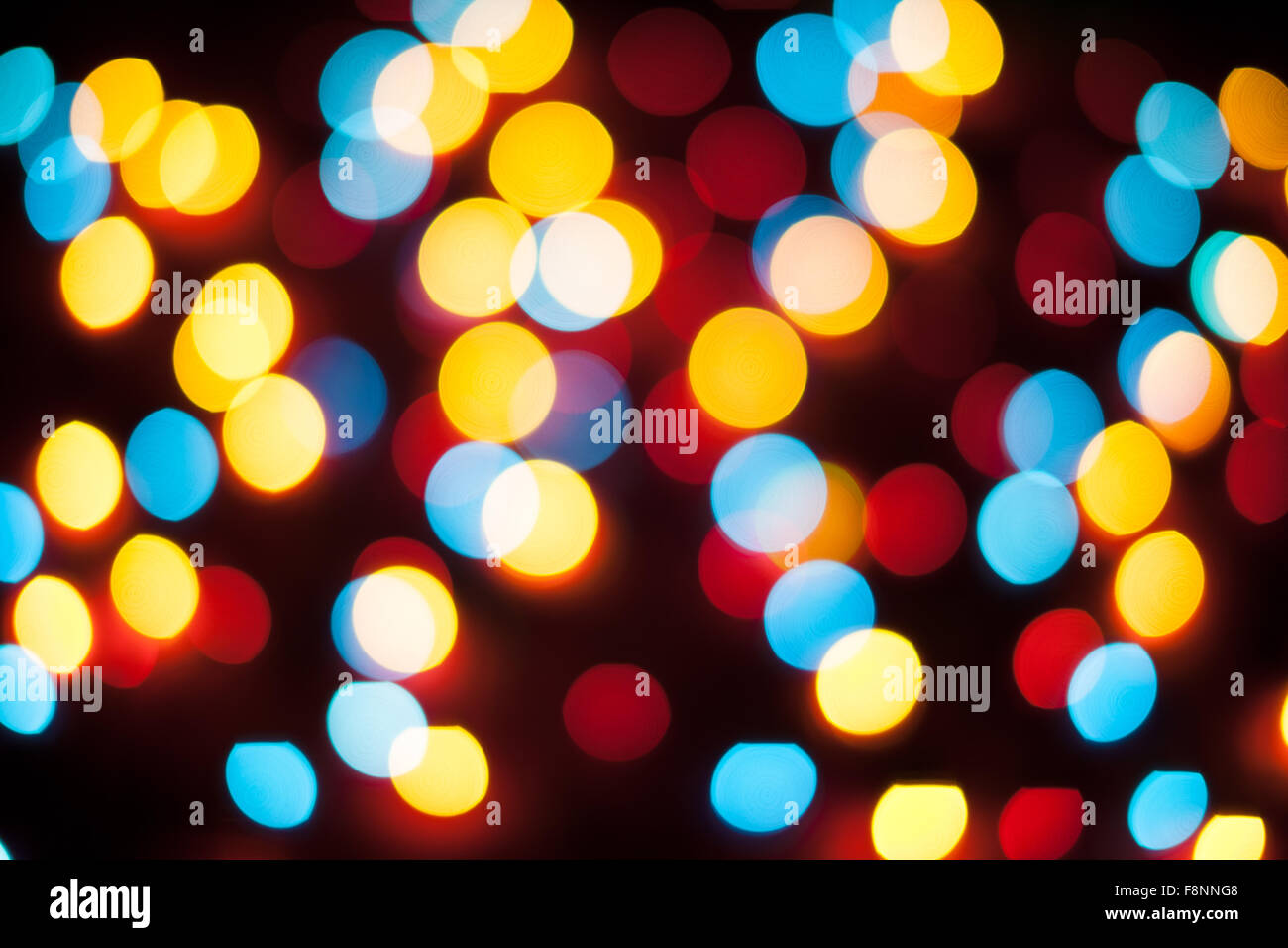 Defocused christmas lights. New Year bokeh. Abstract background for ...