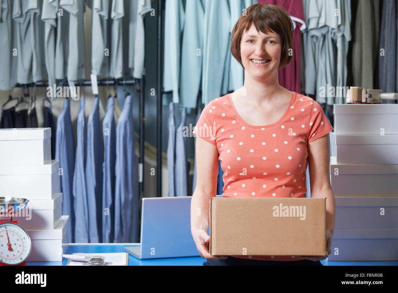 Woman Running On line Clothing Business Stock Photo