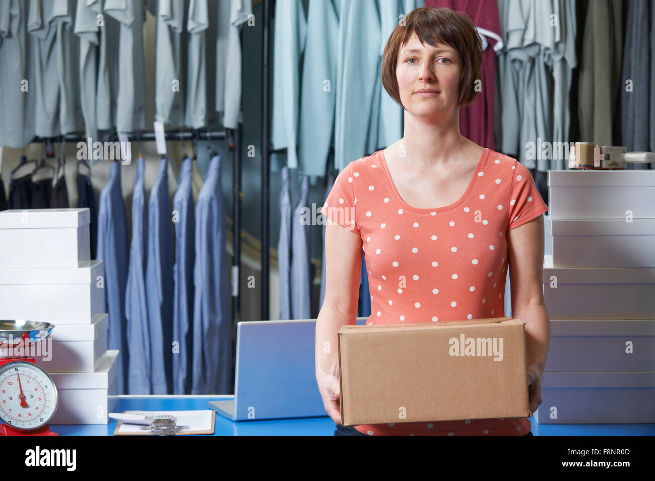 Woman Running On line Clothing Business Stock Photo