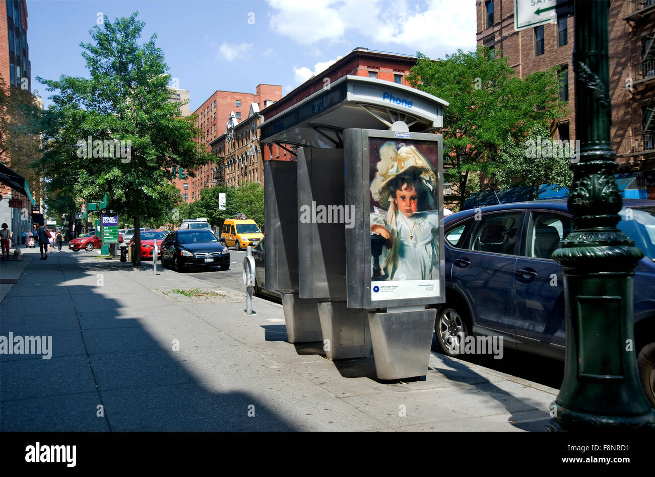 A John Singer Sargent painting is reproduced on a phone booth kiosk in New York  City as part of the Art Everywhere event. Stock Photo
