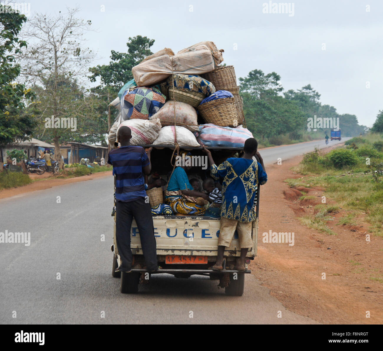 Stock photo of Typical rural transport, overloaded van with people,  Maharashtra, India. Available for sale on