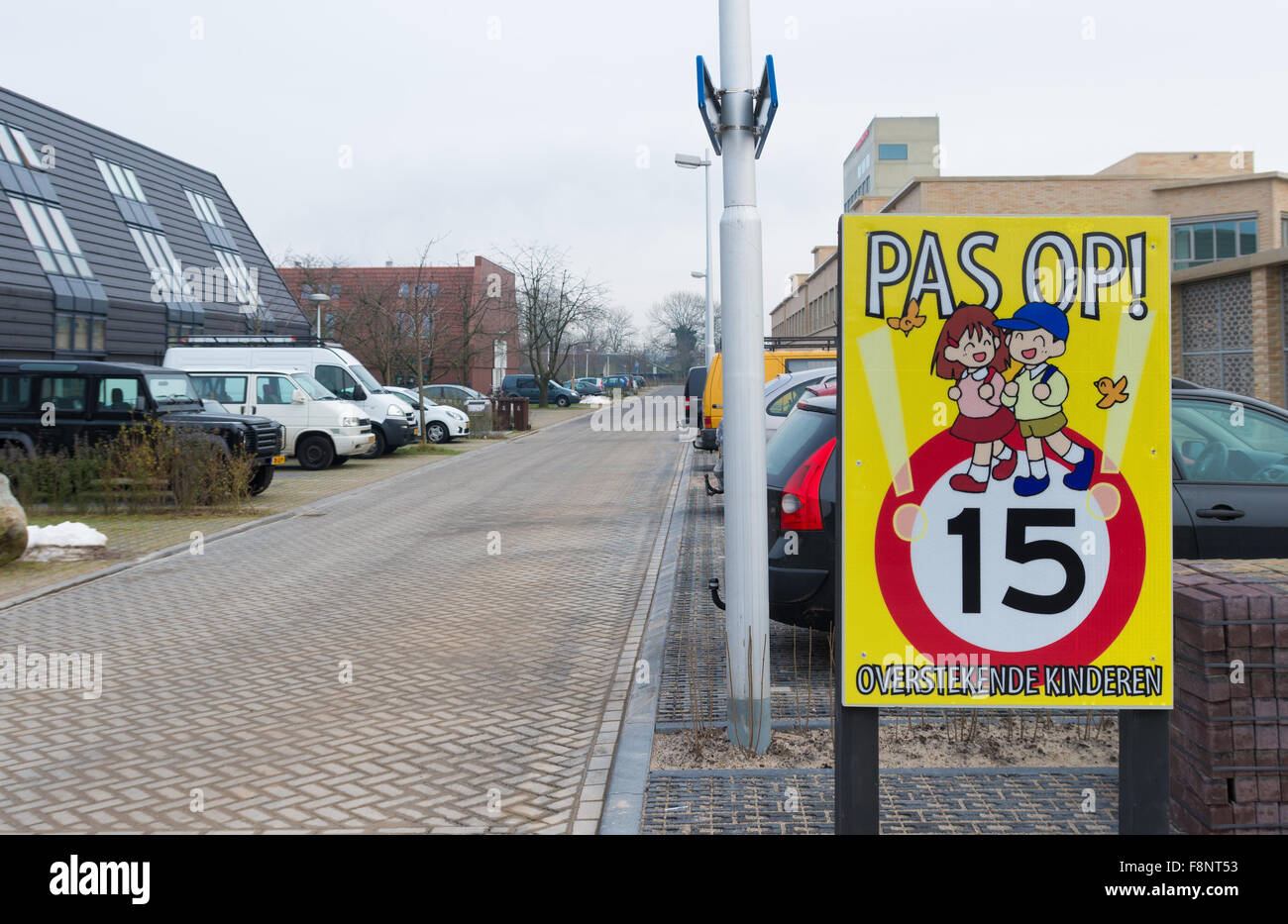 UTRECHT, NETHERLANDS - FEBRUARY 7, 2015: Beware of crossing children sign with speed limit in a residential area Stock Photo