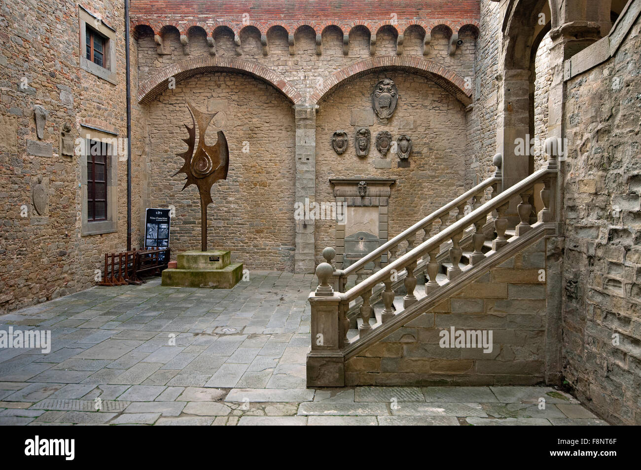 Cortona, courtyard of Palazzo Casali, Tuscany, Italy Stock Photo