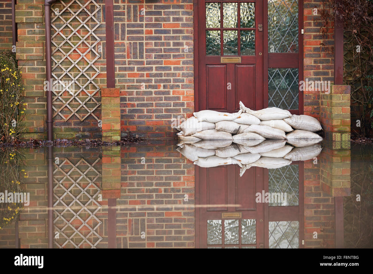Sandbags Outside Front Door Of Flooded House Stock Photo Alamy
