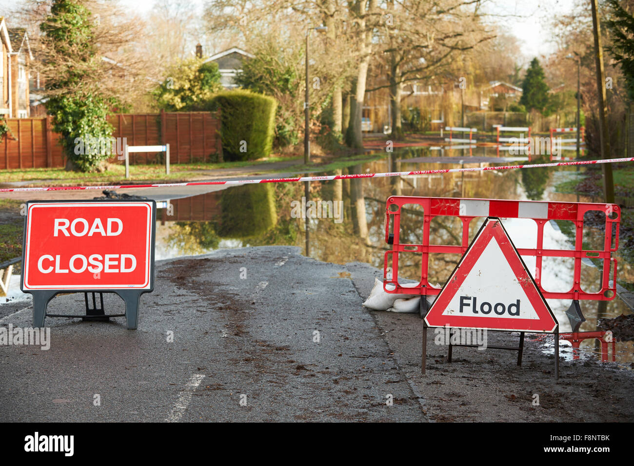 Warnings Signs On Flooded Road Stock Photo