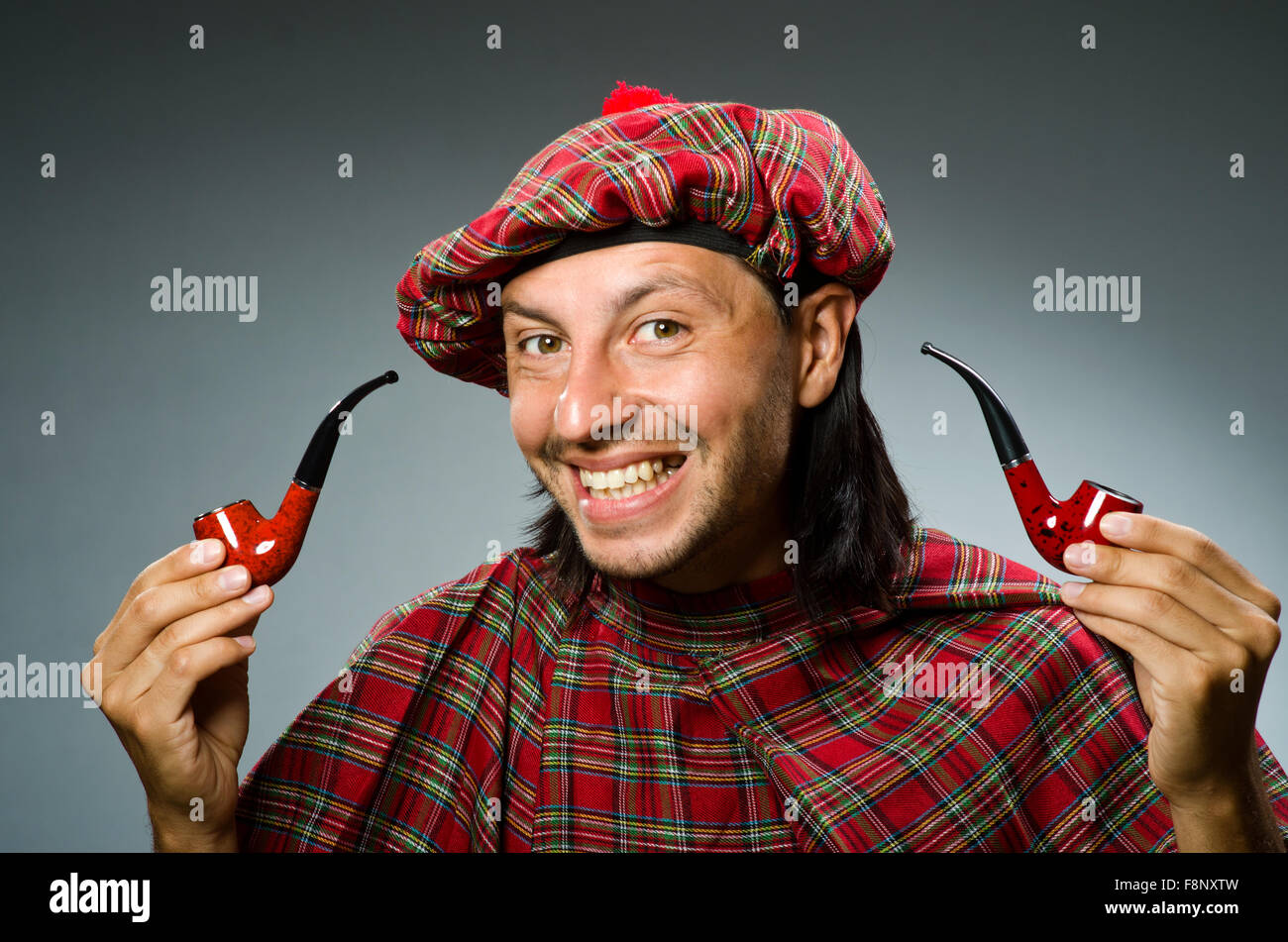 Funny scotsman with smoking pipe Stock Photo Alamy