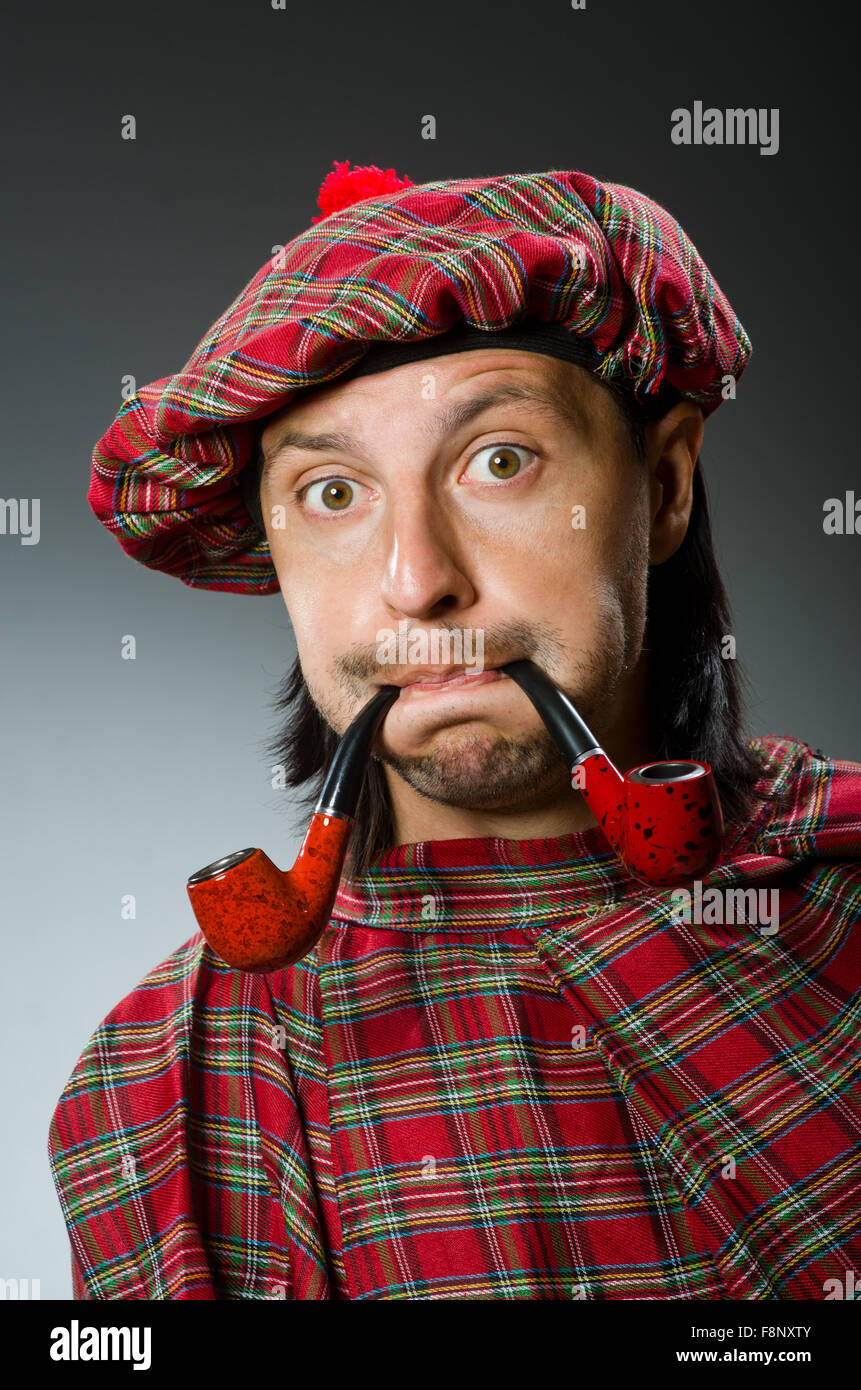 Funny scotsman with smoking pipe Stock Photo Alamy