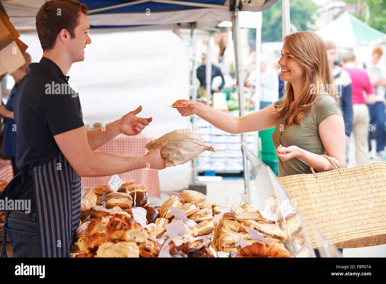 Customer Buying Loaf From Market Bread Stall Stock Photo Alamy