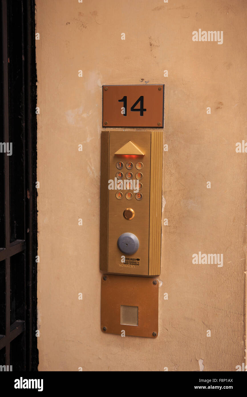 A security door keypad at the entrance to an apartment in the 15th Arrondissement of Paris, France Stock Photo