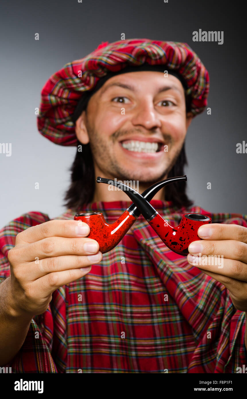 Funny scotsman with smoking pipe Stock Photo Alamy