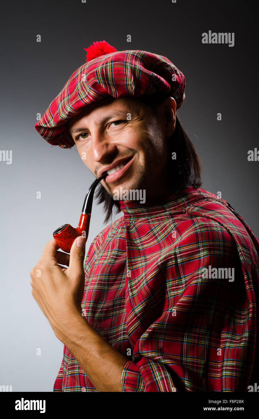 Funny scotsman with smoking pipe Stock Photo Alamy