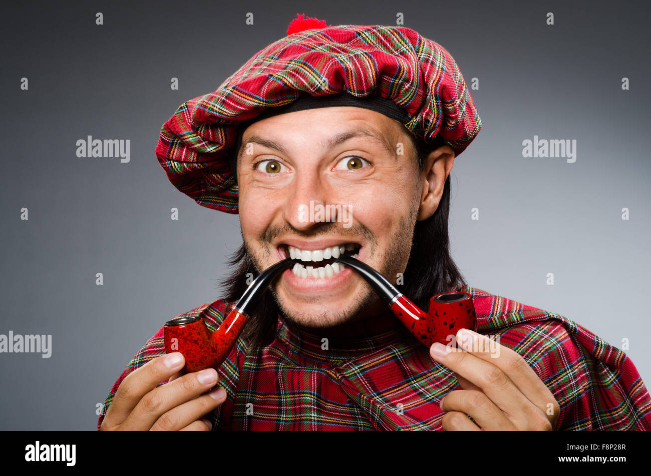 Funny scotsman with smoking pipe Stock Photo Alamy