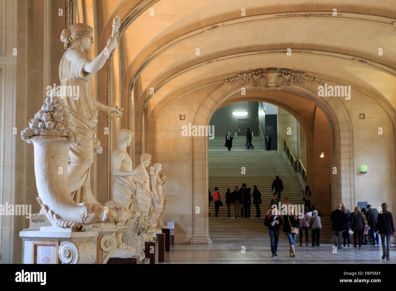 Visitors enjoy the Ancient Roman sculptures in The Louvre Museum, Paris, France Stock Photo Alamy