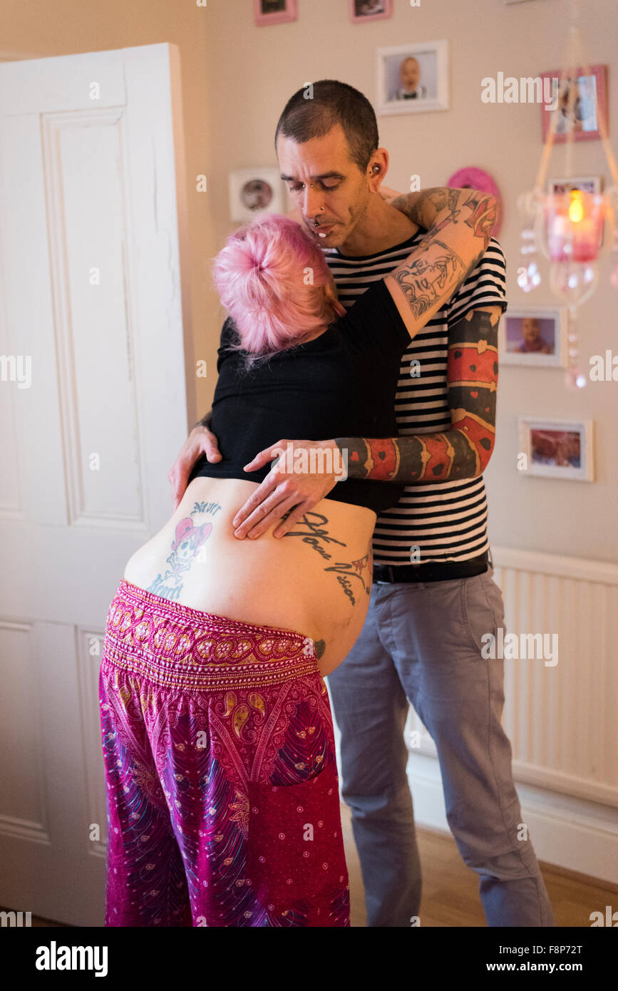 woman-in-labour-having-her-back-massaged-by-her-partner-during-an
