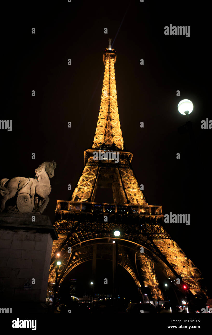 The Eiffel Tower lights up the night sky in Paris, France Stock Photo Alamy