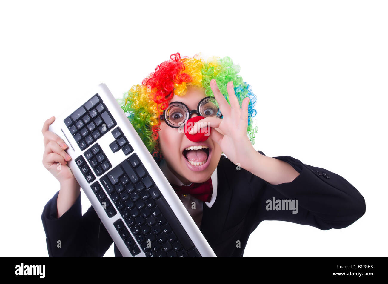 Funny clown with keyboard on white Stock Photo Alamy