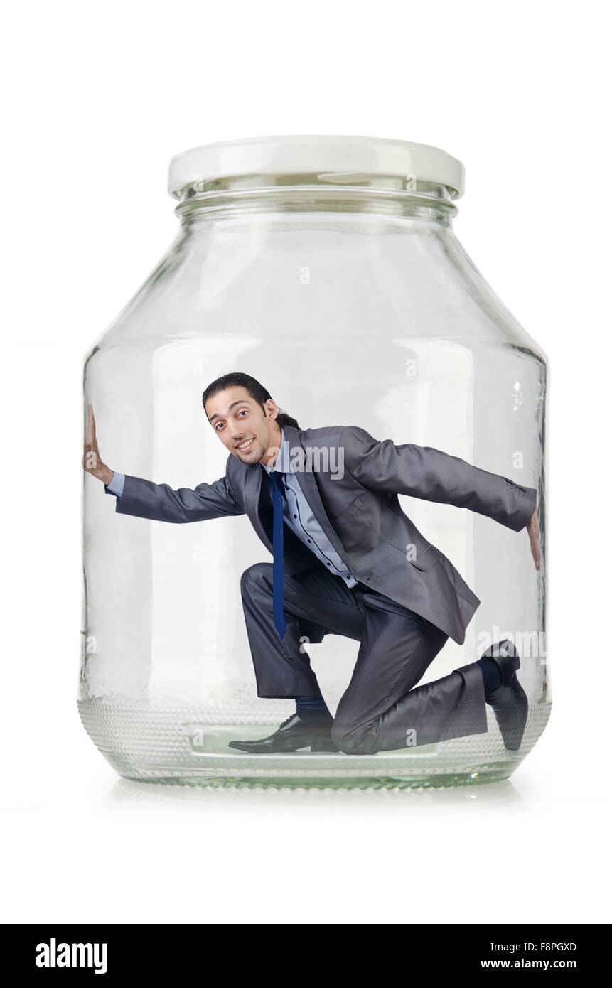 Young businessman in glass jar Stock Photo