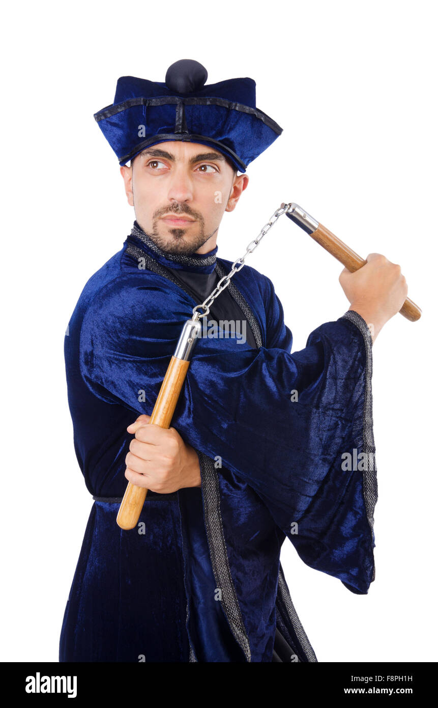 Martial arts master with nunchucks on white Stock Photo