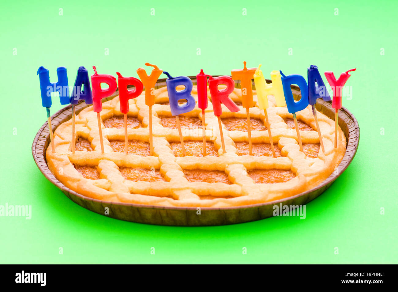 Happy birthday candles in the pie Stock Photo Alamy
