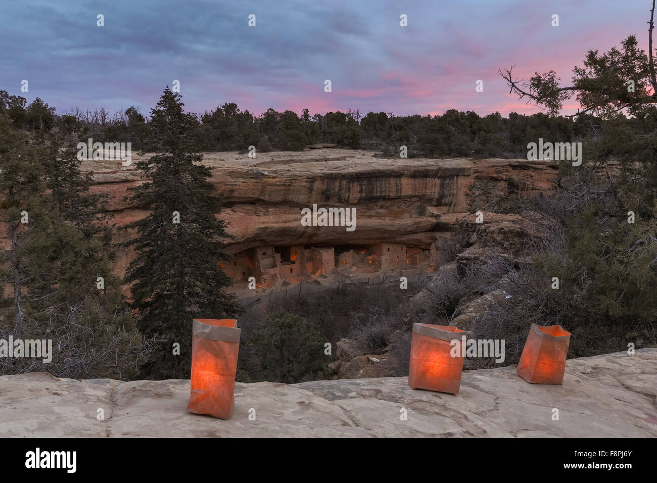 Mesa Verde, Colorado, USA. 10th Dec, 2015. Spruce Tree House the best preserved of the Native American cliff dwellings is illuminated by hundreds of small paper lanterns known as luminaria to celebrate the holiday season during open house December 10, 2015 in Mesa Verde National Park, Colorado. Stock Photo