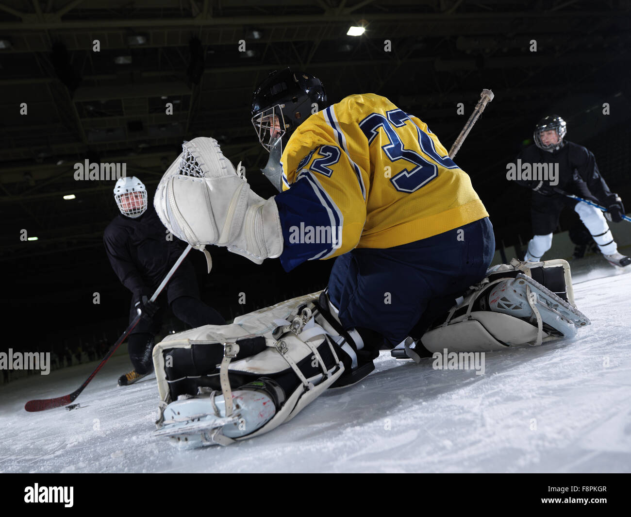 ice hockey goalkeeper player on goal in action Stock Photo Alamy