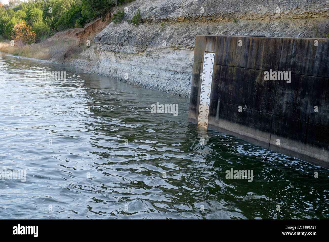 River water level gauge below dam flow pipe discharge US Corps of